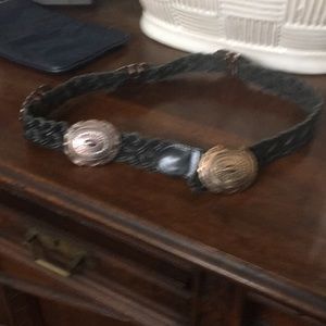 Leather belt with silver buckles.